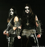 Gorgoroth-bändin promokuva, jossa King ja Infernus seisovat mustaa taustaa vasten corpse-maskit kasvoilla ja niittitavaraa yllään.