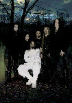 My Dying Bride -bändin jäsenet seisovat rivissä valkoiseen pakkopaitaan puetun miehen takana ja ympärillä. He ovat ulkoilmassa pilvisen taivaan alla ja korven edustalla. Heistä vain pakkopaitamiehellä valkoiset vaatteet, muilla mustat.