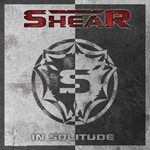 Shearin "In Solitude" -EP:n etukannessan äkyy harmaasävyinen kansigrafiikka. Kuvan vasen laita vaaleanharmaa, oikeanpuoleinen tummanharmaa. Keskellä kuvaa jonkinlainen ympyränmuotoinen symboli, jossa S-kirjain sisällä. Kuvan yläsoassa bändin logo punertav
