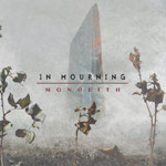 In Mourningin albumin "Monolith" etukannessa näkyy suuri pylväsmäinen monliitti, joka on valkoisen udun seassa siten, että sen päällä lukee mustalla värillä In Mourning -logo ja logon alla punaisella värillä äänitteen nimi. Kuvassa etualalla näkyy harvoja