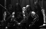 Harmaasävyinen ryhmäkuva Gorgorothin kokoonpanosta. Kuva otettiin vuoden 2009 aikana Metalion-nimisen kuvaajan toimesta. Kuvassa näkyy keskimmäisenä yhtyeen uusi laulaja Pest ja sen kitaristi Infernus.