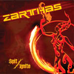 "Spit/Ignite"-albumin etukannessa tummanpunainen tausta, jota vasten keltaisella värillä Zarthas-logo ja albumin nimi. Kuvan oikeassa reunassa punainen ihmishahmon piirros.
