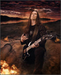 Kamelotin kitaristin virkaa hoitava Thomas Youngblood poseeraa liekkien ympäröimässä aavemaailmassa, jonka taivas on tumma ja tulinen. Miehellä musta kitara kourissaan, toinen käsi näyttää pirunmerkkiä.